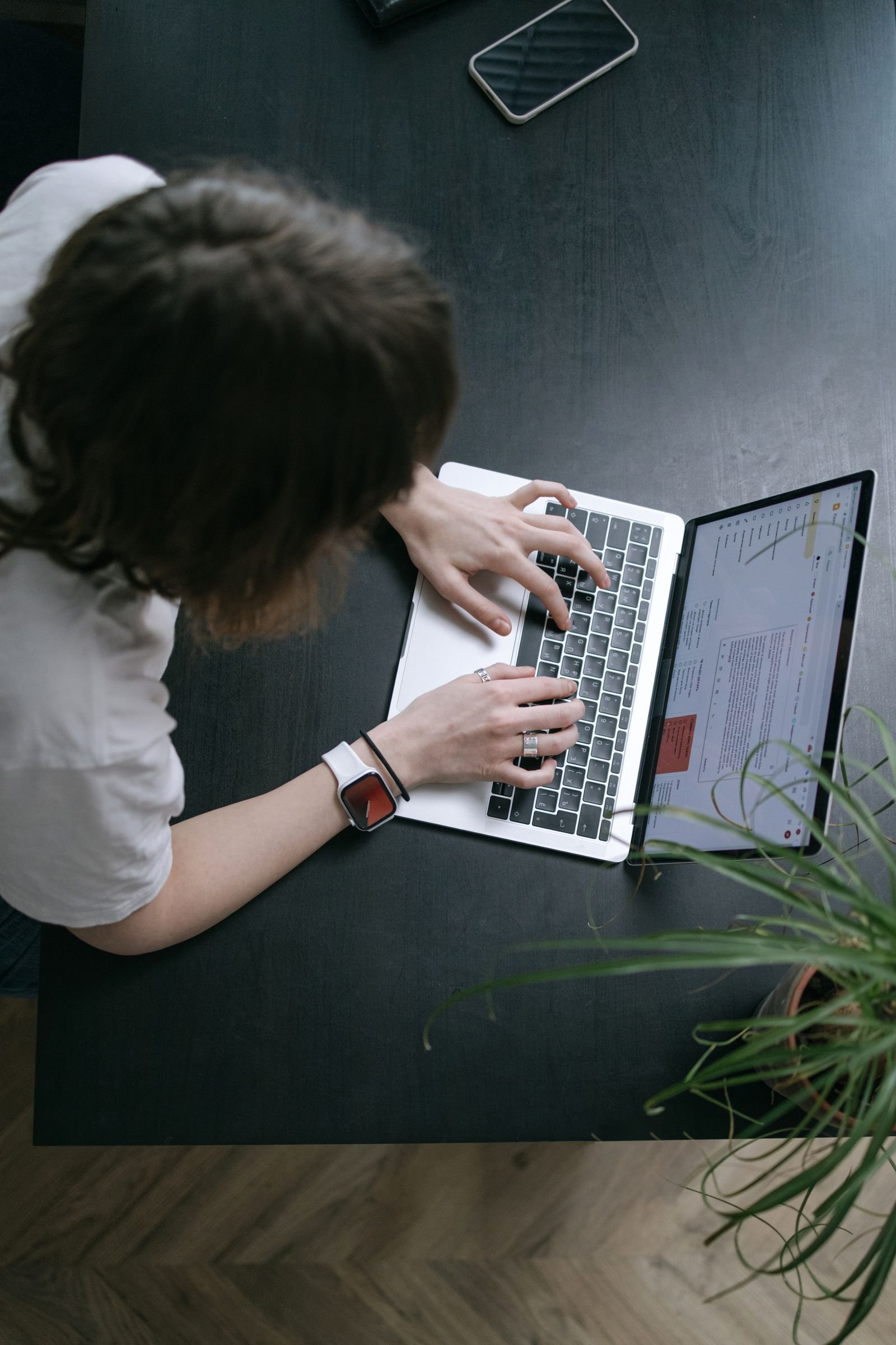Planning work with a laptop and phone