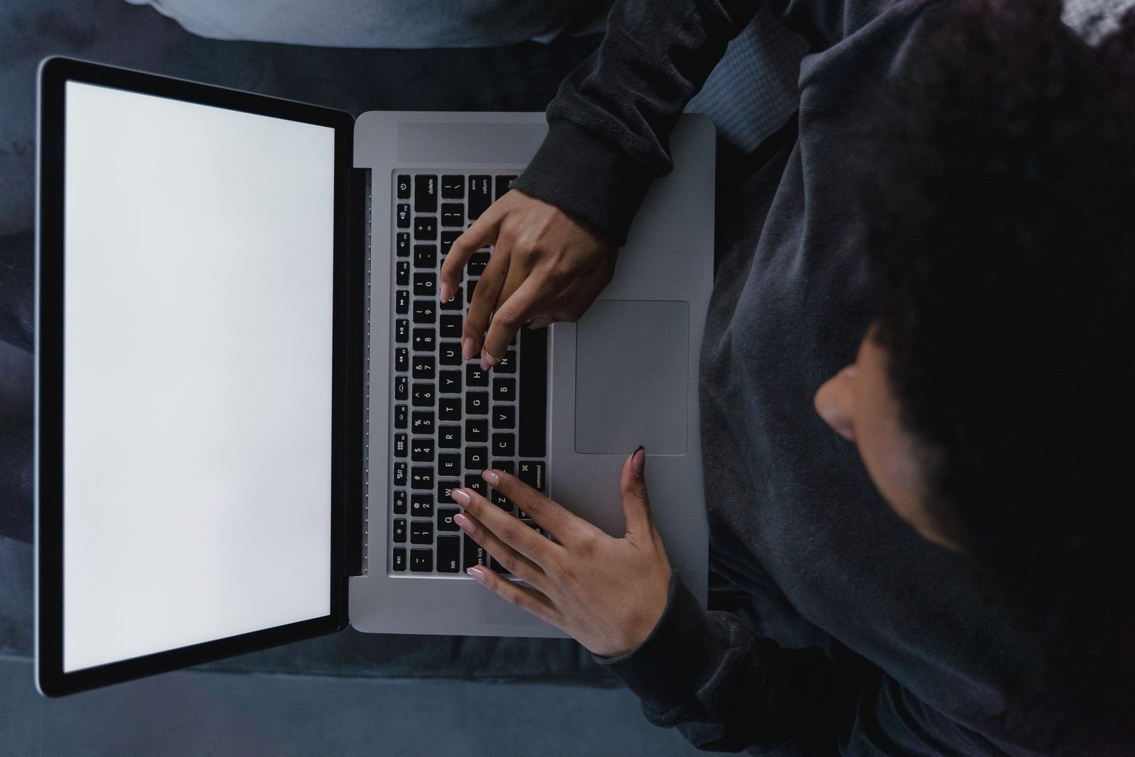 Laptop workspace in soft light — planning the next piece of content