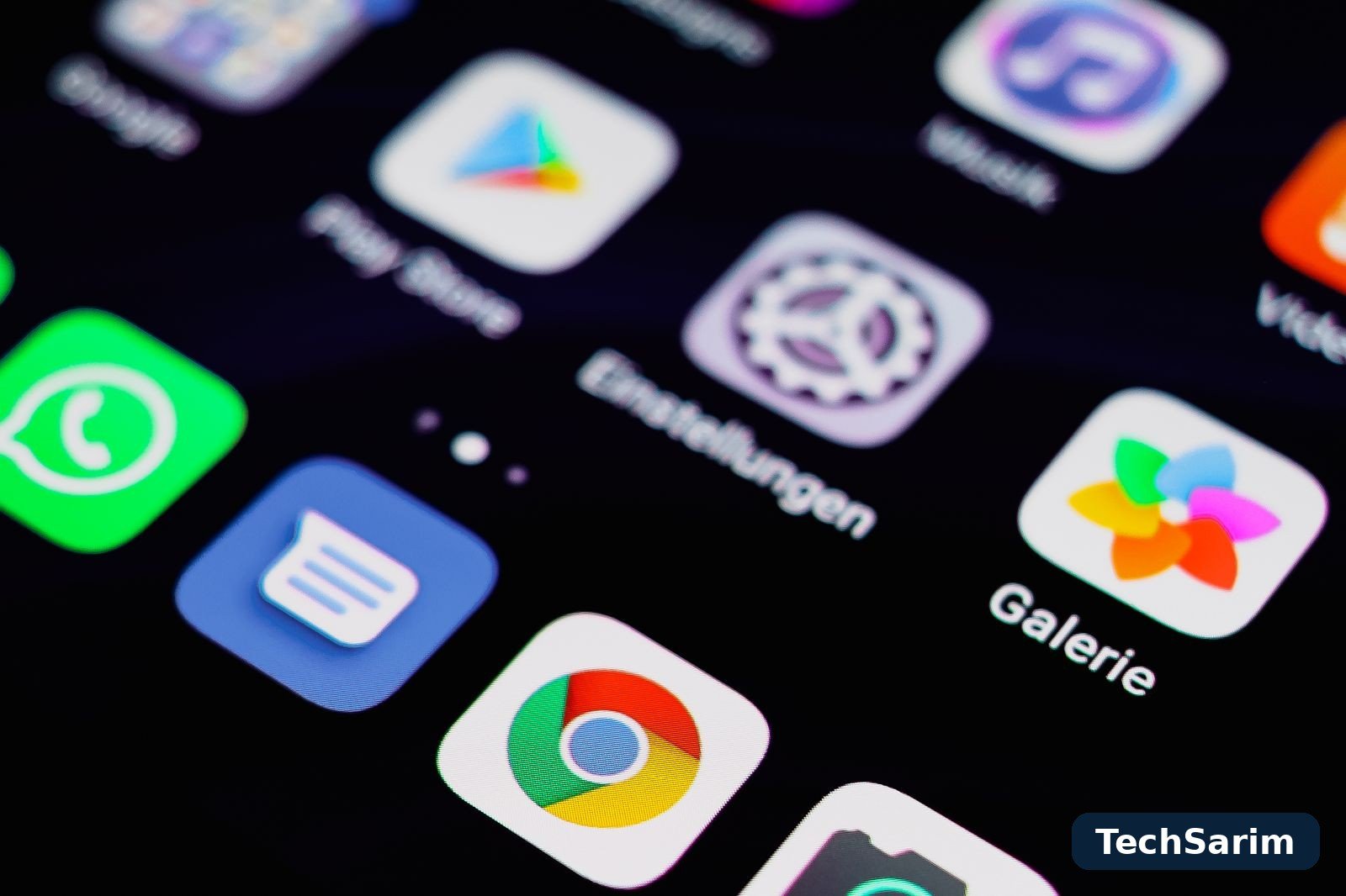 Close-up of Android app icons on a home screen, including Play Store, Chrome and Gallery